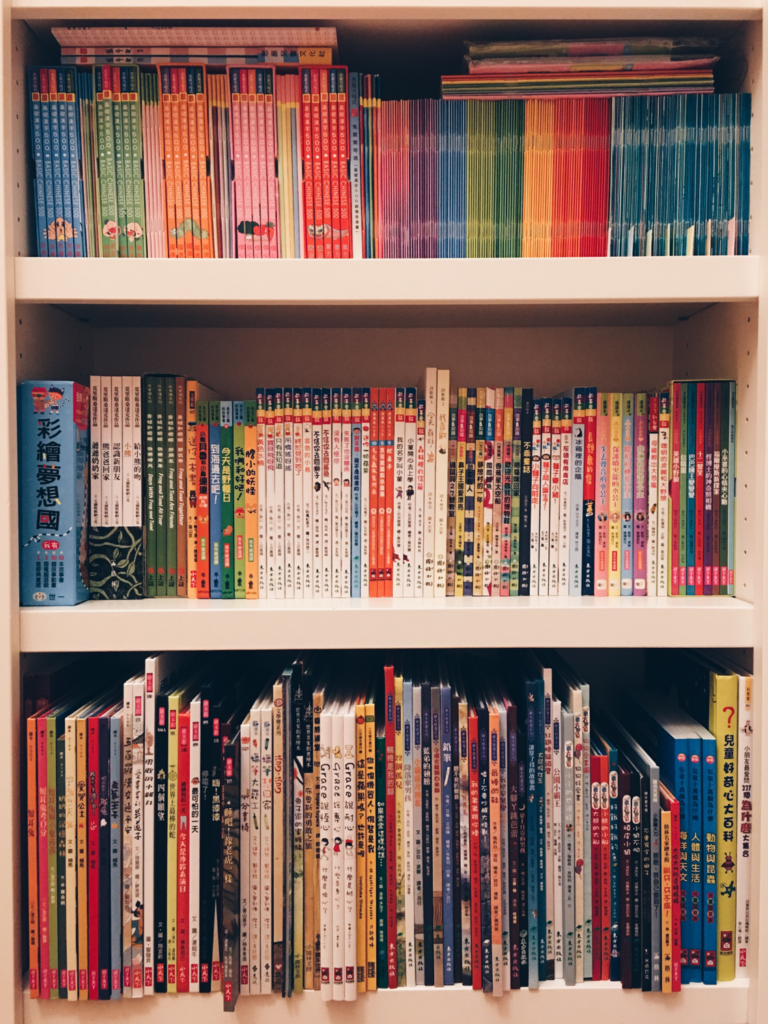 The photo represents ~30% of my Chinese book collection and nearly all of the books I have used so far after the pre-reading stage. Top shelf: Sagebooks 500, Greenfield I Can Read, and Greenfield Magic Box. Middle shelf: Level 0 and some Level 1 books. Bottom shelf: picture books.